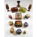 A group of Kashmiri painted trinket boxes and eggs plus crushed gemstone trinket box featuring
