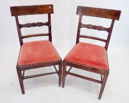 A pair of early 19th century bar back dining chairs on square tapered supports