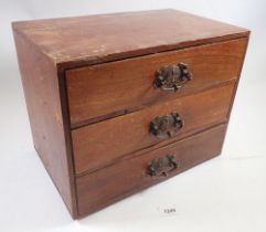 A vintage set of three oak filing drawers, 35cm wide