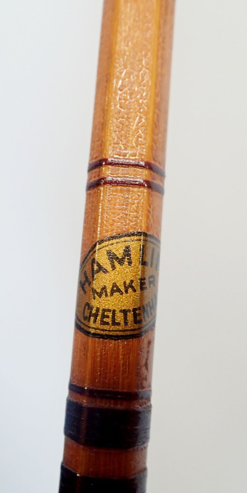 A two piece split cane fishing rod by Hamlin Cheltenham in brown cloth bag and two wooden fishing - Image 2 of 2