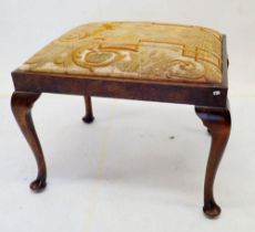 A George III walnut stool with tapestry top, 66cm wide