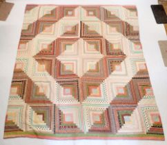 A vintage large patchwork quilt 218 x 187cm