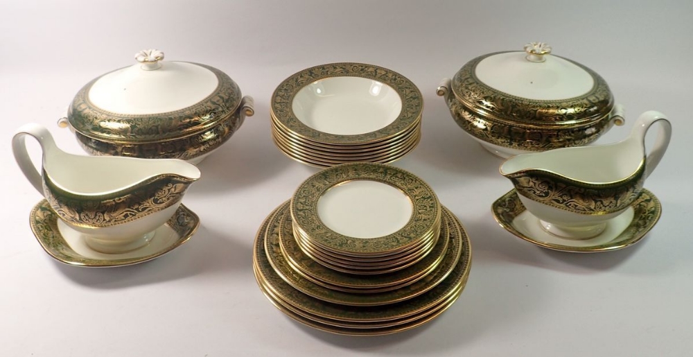 A Wedgwood Florentine 'Arras Green' dinner service comprising two tureens with lids (one cracked),