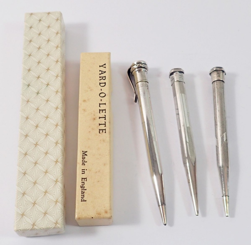 Two sterling silver Yard O Led 'Lette'pencils and box and a silver plated Eversharp one and box