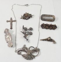A silver marcasite necklace and similar flower spray brooch plus four silver brooches, silver
