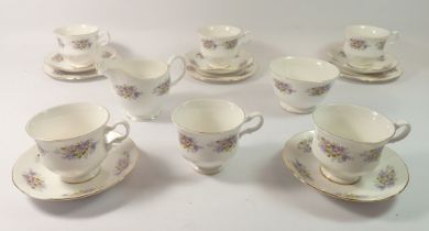 A Royal Kent floral printed vintage tea service comprising six cups and five saucers, three tea