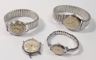 A group of four vintage mechanical watches including Roamer etc.