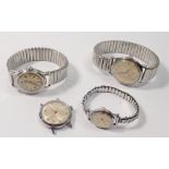 A group of four vintage mechanical watches including Roamer etc.