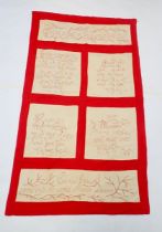 An Australian vintage embroidered hanging with panels of script, 163 x 94cm