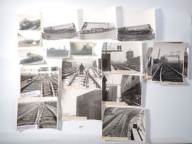 A quantity of circa 1940's black and white photographs relating to Waterloo Station of