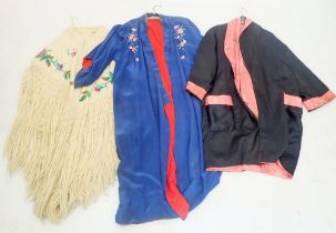 Two Japanese silk dressing gowns and an embroidered wool cream shawl