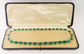 An Art Deco white metal and green paste necklace