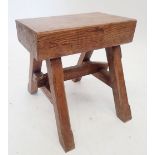 A rustic stool with later additions, 32 x 31 x 33cm