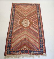 A Turkish decorative kelim rug with geometric decoration, 200 x 123cm