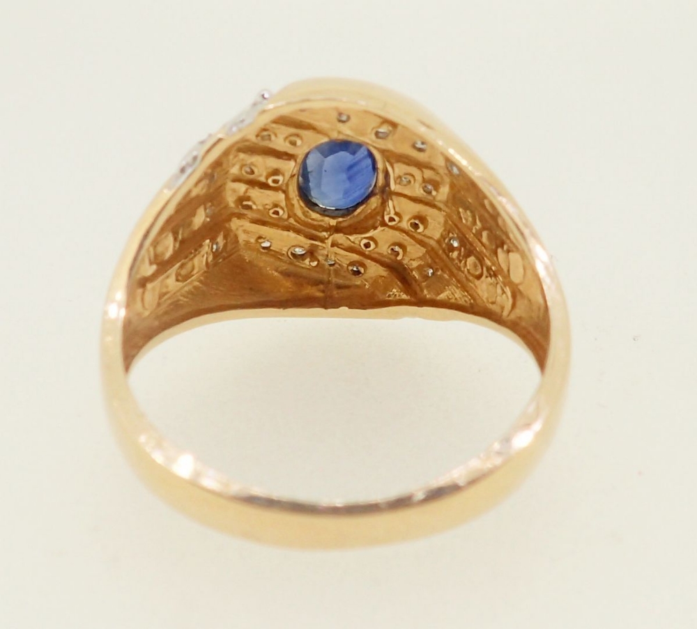 A 10k gold ring set oval cut sapphire in five diagonal rows of channel set diamonds, 5.6g, size W - Image 4 of 4