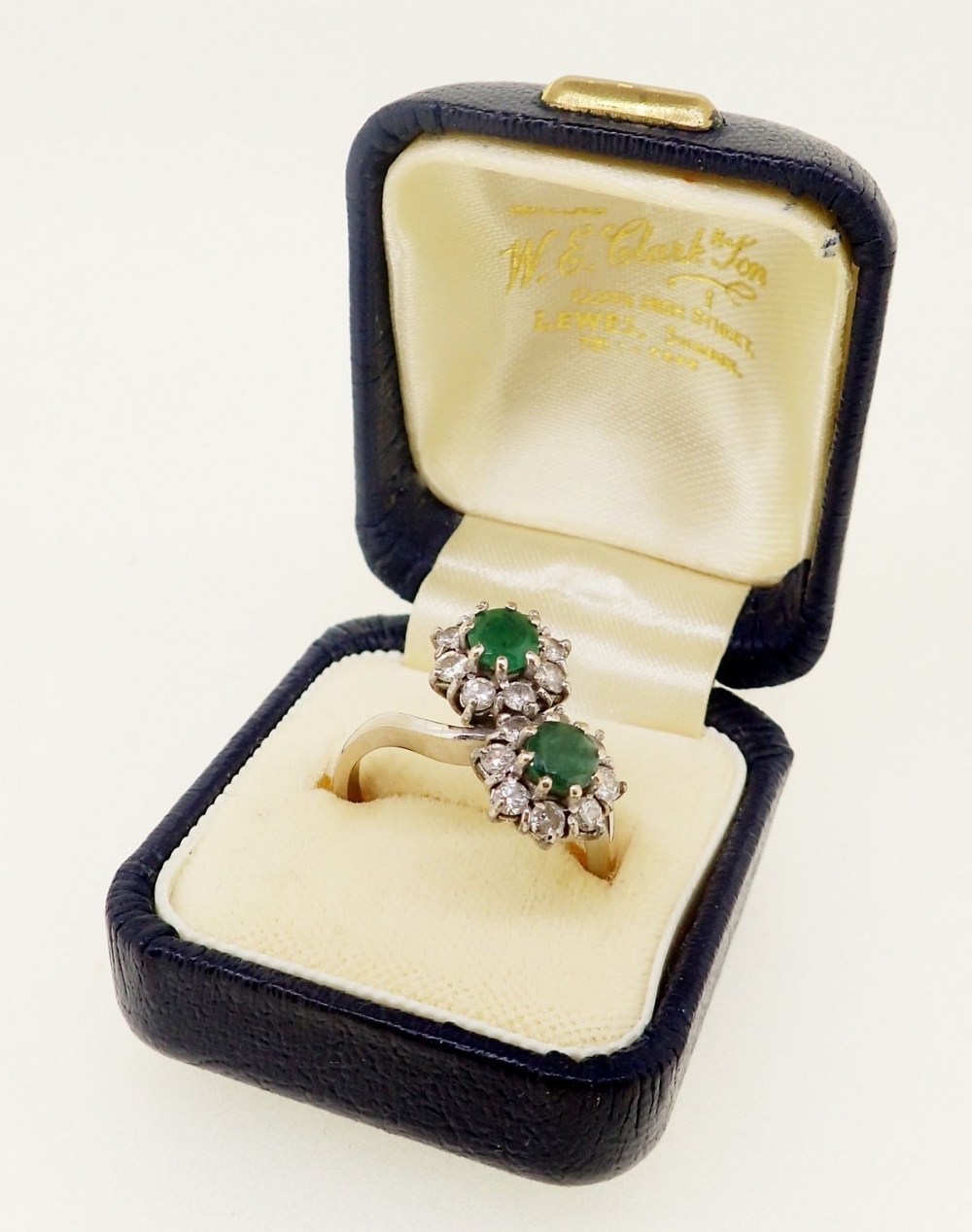 An 18 carat gold emerald and diamond cluster crossover ring, size O - Image 5 of 5