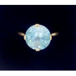 A 9 carat gold blue zircon set ring, size K, boxed 3.3g