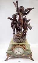 A French mid 19th century onyx clock with floral painted enamel dial and spelter cherub surmount,