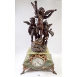 A French mid 19th century onyx clock with floral painted enamel dial and spelter cherub surmount,