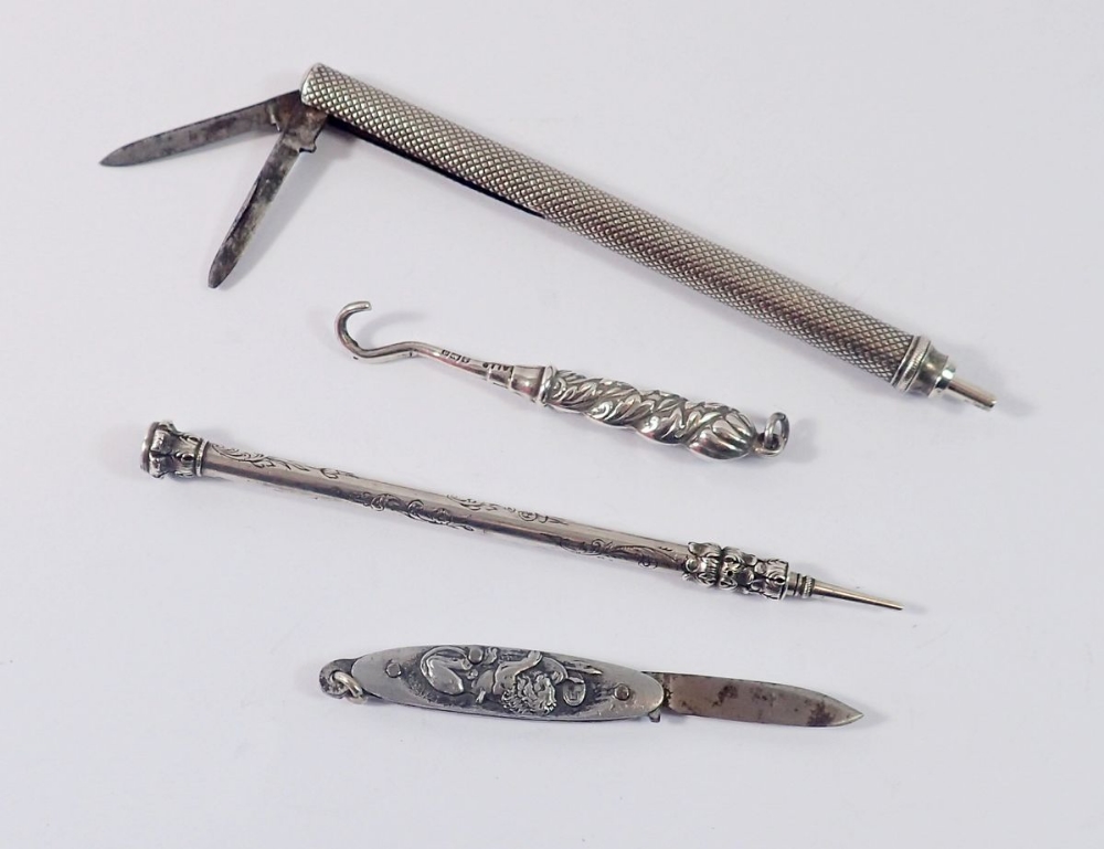 A white metal pencil with two folding blades, another white metal pencil, penknife etc.