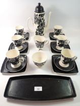 A Carlton Ware vintage coffee set decorated black sunflowers comprising coffee pot (lid a/f), six