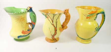 Three Burleigh Ware jugs with parrot, dragon and squirrel handles