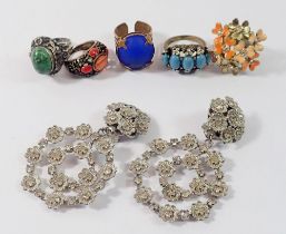 A white metal ring set turquoise and four other large dress rings and a pair of white metal large