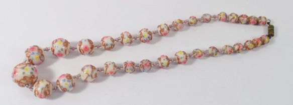 An early 20th century Venetian floral painted glass necklace