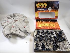 A Millenium Falcon toy by Hasbro LFL 55cm long and a Star Wars saga edition chess set