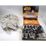 A Millenium Falcon toy by Hasbro LFL 55cm long and a Star Wars saga edition chess set