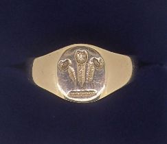 A 9 carat gold gents signet ring engraved Prince of Wales feathers, 4.1g, size X to Y