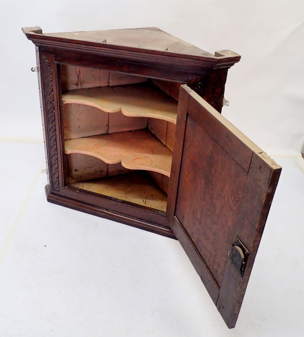 An 18th century oak single door corner cupboard with carved decoration, 78cm tall - Image 2 of 2