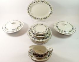 A Royal Doulton 'Burgundy' dinner service comprising six dinner plates, six side plates, six tea