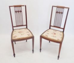A pair of Edwardian mahogany slat back bedroom chairs