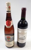 A Chateau Laroque Saint Emillion Grand Cru 2003 and a bottle of Rheinhessen 1988