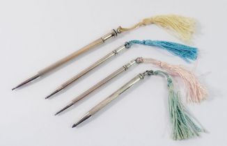 Four various silver bridge pencils