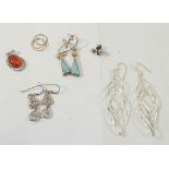 Four pairs of silver earrings, three yellow metal earring and a silver and amber pendant