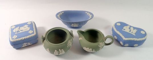 A Wedgwood group of five items of Jasperware including two trinket boxes, jug etc.