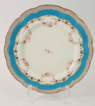 A Royal Worcester plate painted floral swags in turquoise border, 23cm diameter