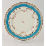 A Royal Worcester plate painted floral swags in turquoise border, 23cm diameter