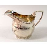 A Victorian silver cream jug, Edward Hutton, London 1881, 102g