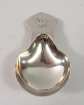 A silver caddy spoon, Chester 1918 engraved 'Pansy 1925'