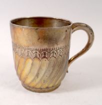 A silver spiral fluted and engraved christening mug, Birmingham 1893, 102g by John Edward Wilmot