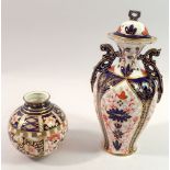 A Royal Crown Derby vase and cover painted Imari style decoration (chip to inner lid rim), 20cm tall