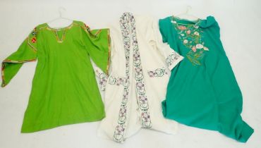 Two green tunic style embroidered dresses and a dressing gown