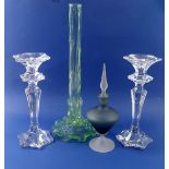 A pair of faceted glass candlesticks, 26cm tall, an Edwardian green stem vase and a frosted scent