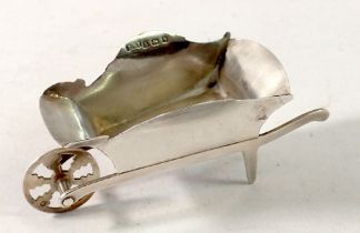 A miniature silver wheelbarrow, Birmingham 1907 by Levi & Salaman, 6 x 8cm long