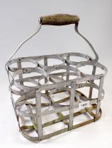 A vintage metal milk bottle holder