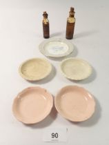 A United States Air Force ashtray, four miniature saucers and two antique glass medicine bottles