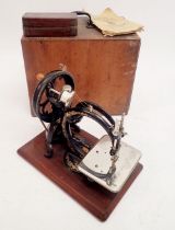 A Victorian Wilcox & Gibbs Automatic Silent sewing machine with box and instructions